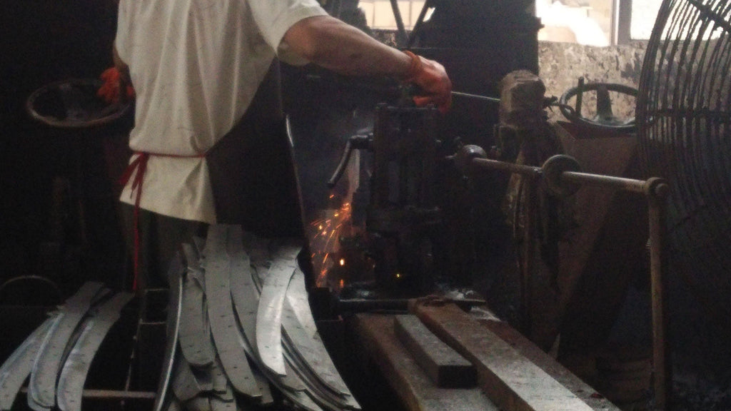 A Chinese factory producing counterfeit items resembling authentic Japanese swords